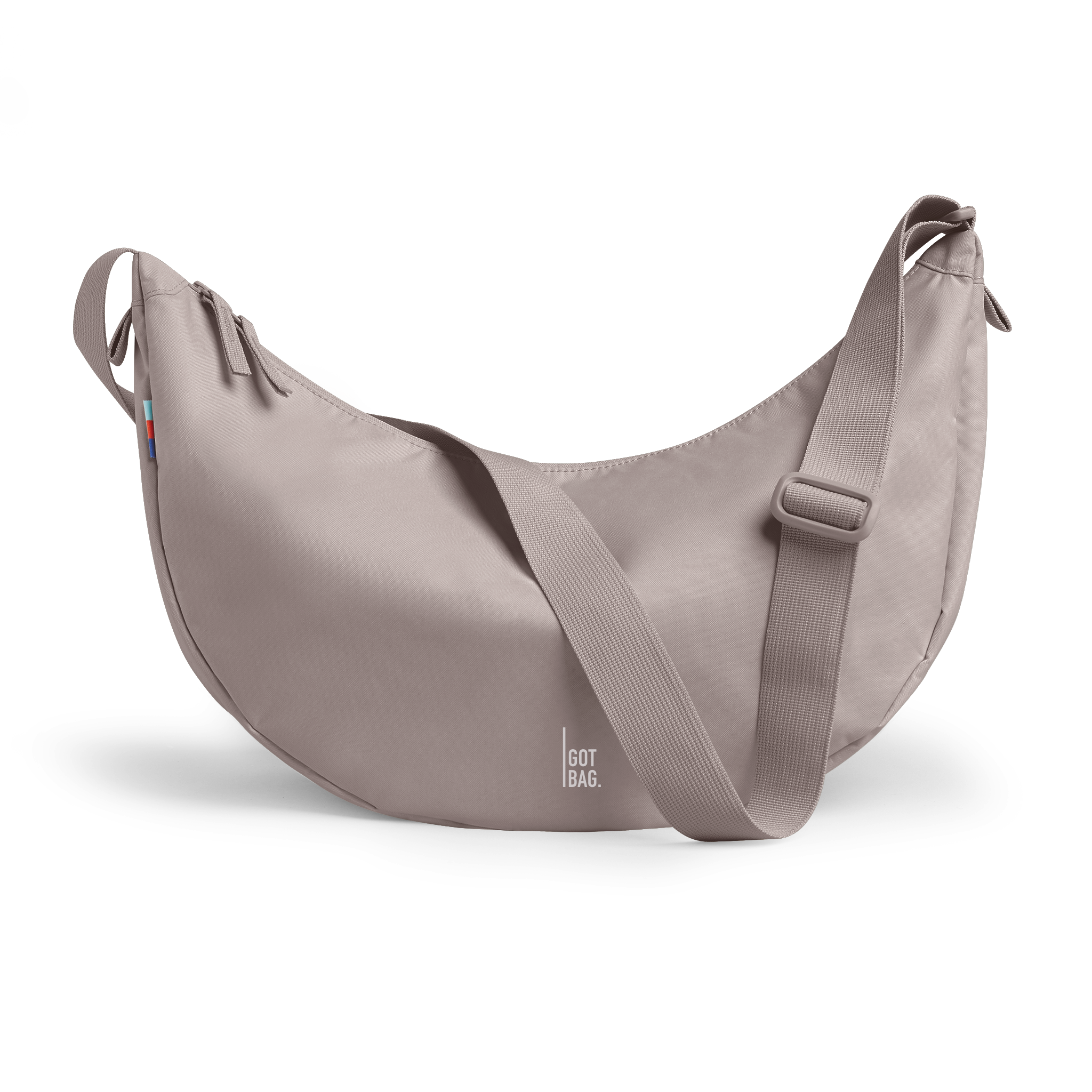 MOON BAG LARGE Tasche in seahorse (graues Pastellrosa) als Studioaufnahme in Frontansicht.