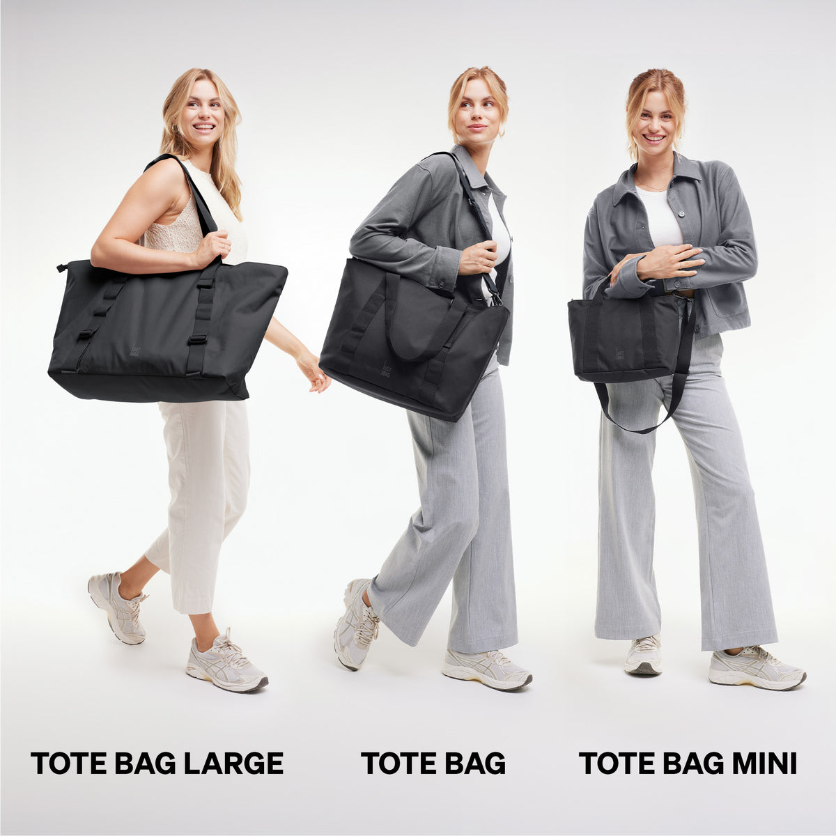 Drei Frauen zeigen TOTE BAG Taschen in black (Schwarz) in drei Größen.