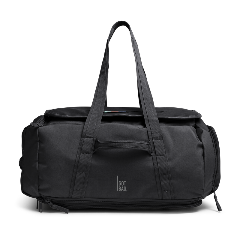 DUFFLE PACK taška v barvě black (Černý) jako studiová fotografie zepředu.