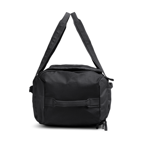 DUFFLE PACK Tasche in black (Schwarz) als Studioaufnahme in Seitenansicht.