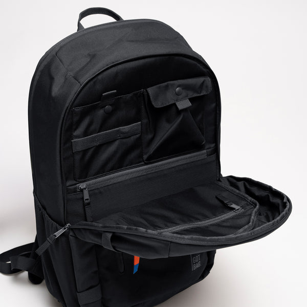 HYBRID PACK backpack in black (classic black) in front view with open main compartment.