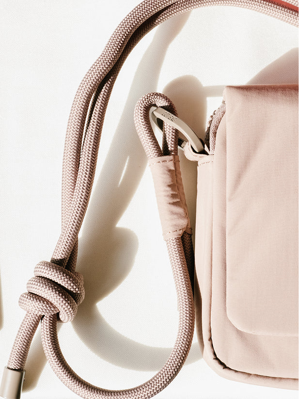 ESSENTIAL BAG bag as a detail shot with knotted strap.