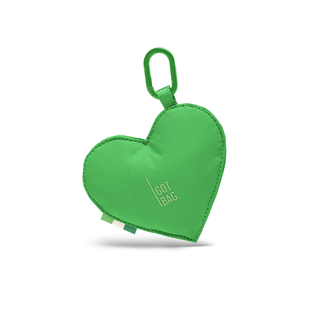 TREASURE CHARM Accessoire, herzförmig mit Karabiner und GOT BAG. Logo in Frontansicht.