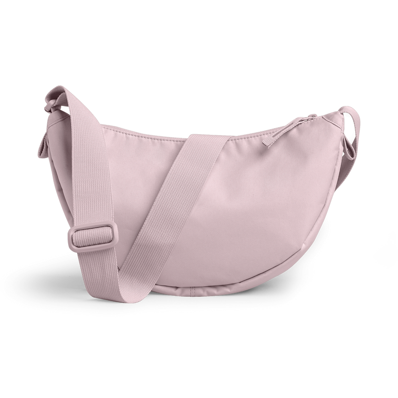 MOON BAG SMALL MONOCHROME Tasche in pink dolphin (blasses Hellrosa) als Studioaufnahme.