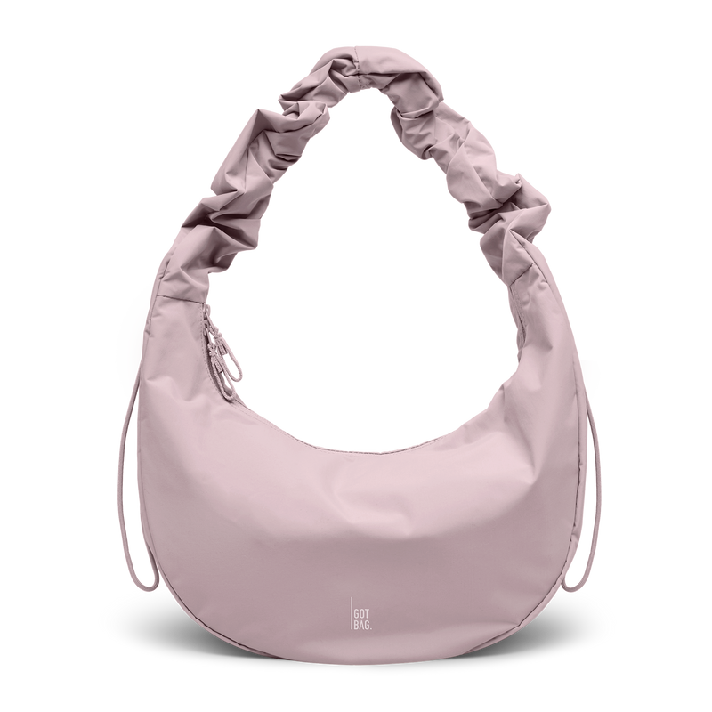 MOON BAG RUFFLE tas in pink dolphin als studio-opname in vooraanzicht.