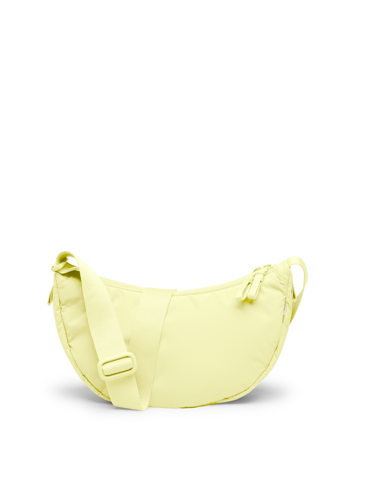 CLOUD MOON BAG SMALL Tasche in sea lemon (zartes Pastellgelb) als Studioaufnahme in Rückansicht.