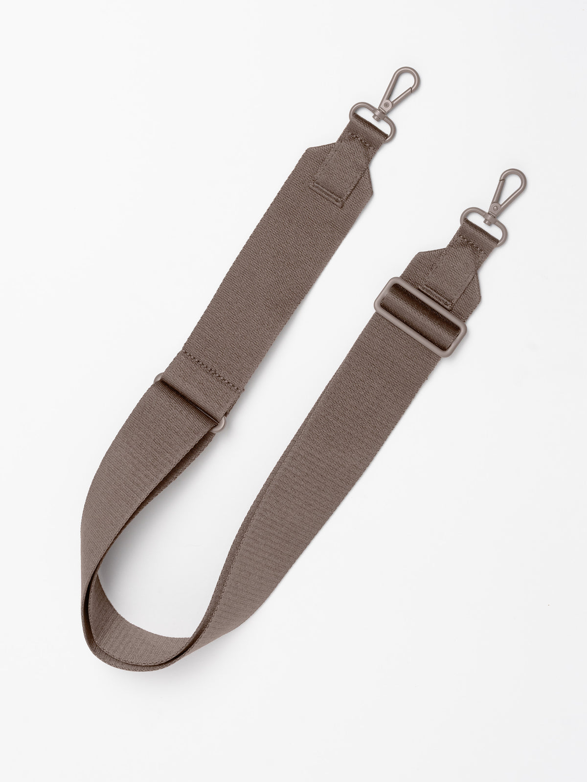 Accessoire für PUFFER HORIZON TOTE BAG: Crossbody Gurt in oyster (klassisches Taupe-Braun) auf weißem Hintergrund.