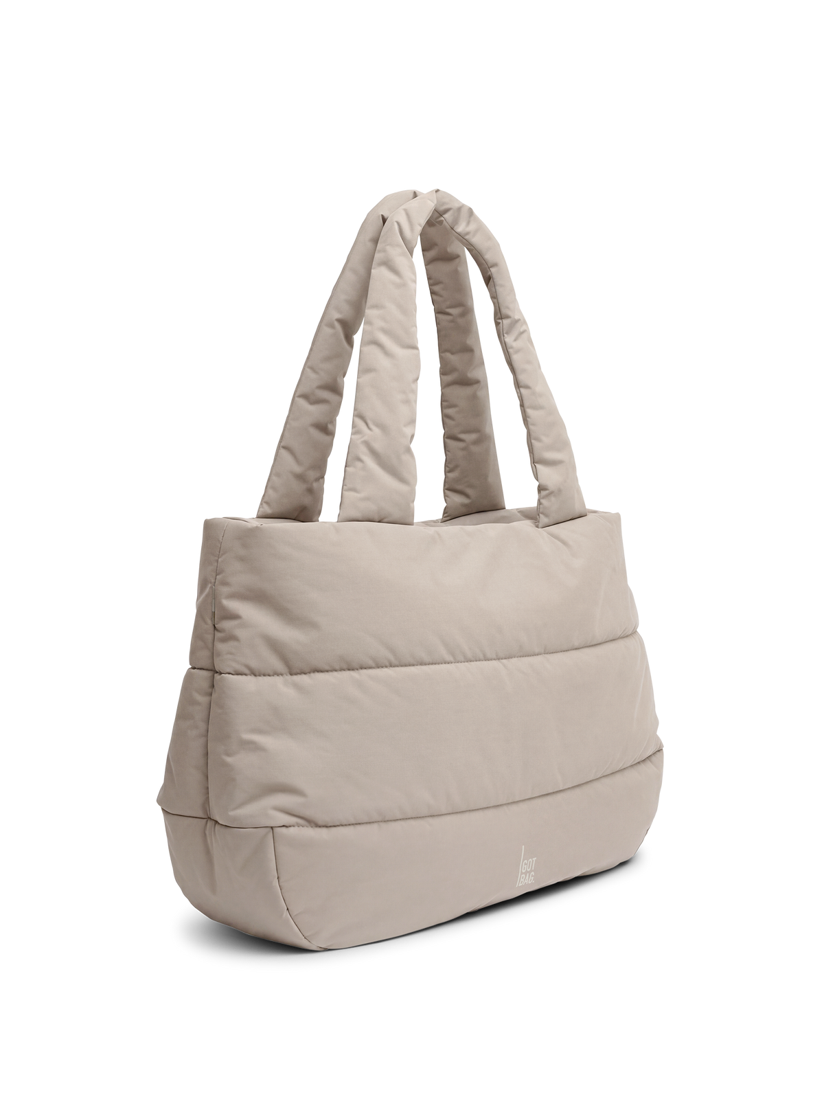 PUFFER HORIZON TOTE BAG Tasche in scallop (helles Beige) in Diagonale Ansicht.