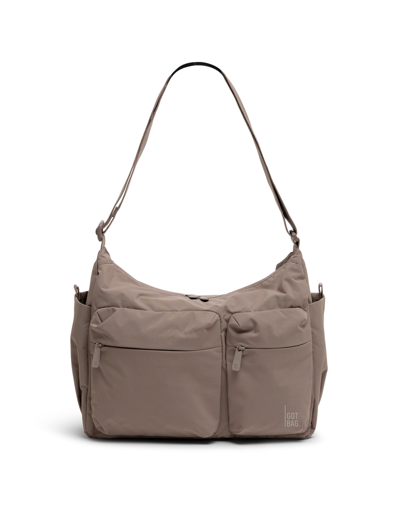 POCKETSLINGBAG bag in oyster (classic taupe-brown) as a front studio shot.