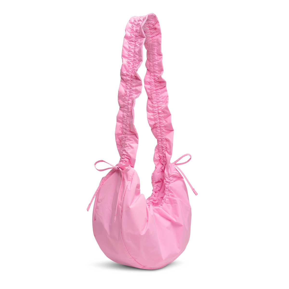 MOON BAG BOW Tasche in sea rose (sattes Pastell-Rosa) in schräger Ansicht.