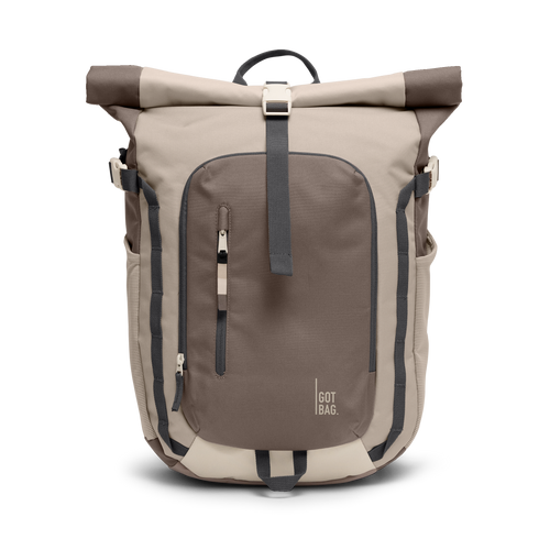 ROLLTOPADVENTUREMONOCHROME sac à dos en multioyster avec fermeture roll-top et poches zippées, vue de face.