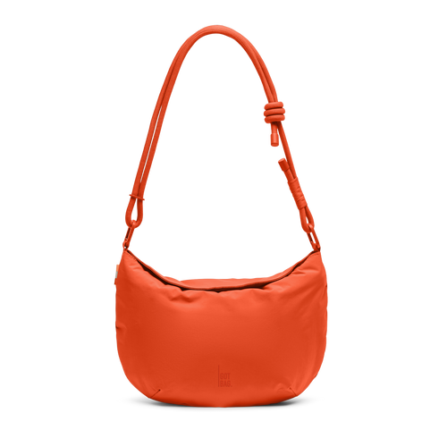 CLAM BAG bag in hot coral (vibrant orange) as a studio shot in front view.