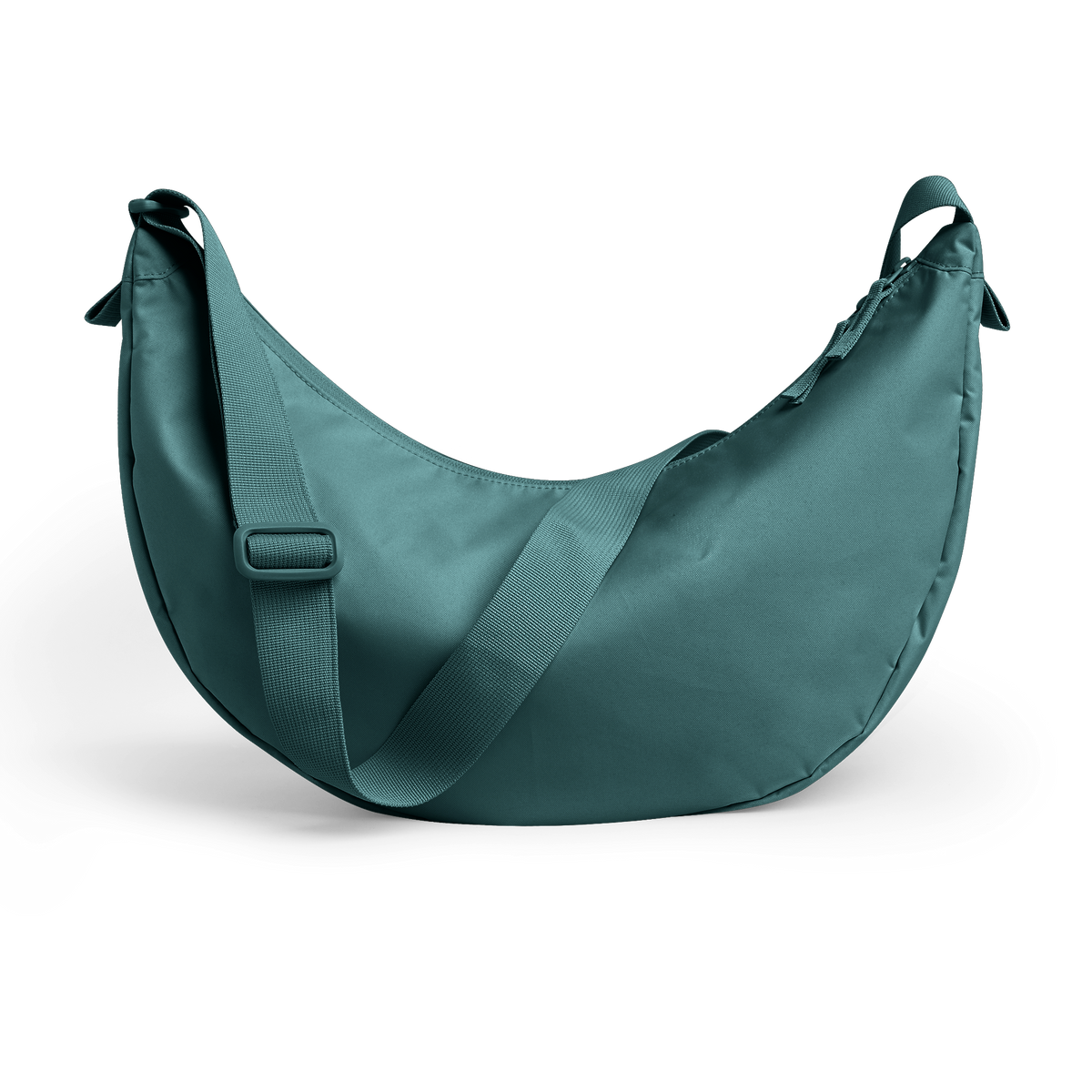 MOON BAG LARGE Tasche in sea teal (kühles Türkisgrün) als Studioaufnahme in Rückansicht.