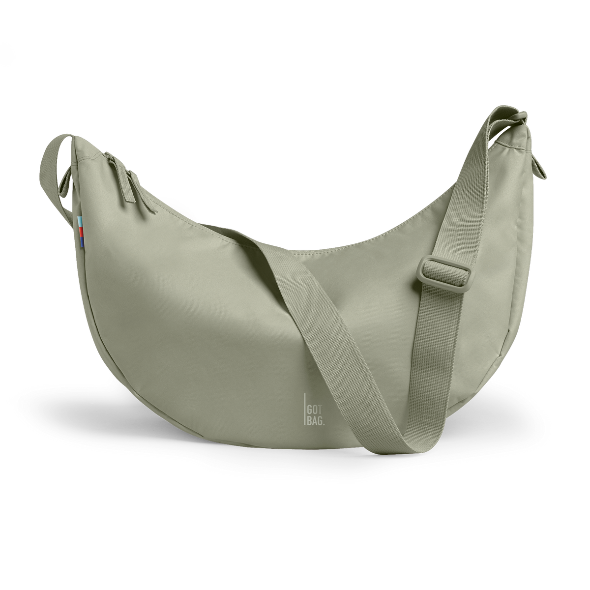 MOON BAG LARGE Tasche in seabed (helles Olivgrün) als Studioaufnahme in Frontansicht.