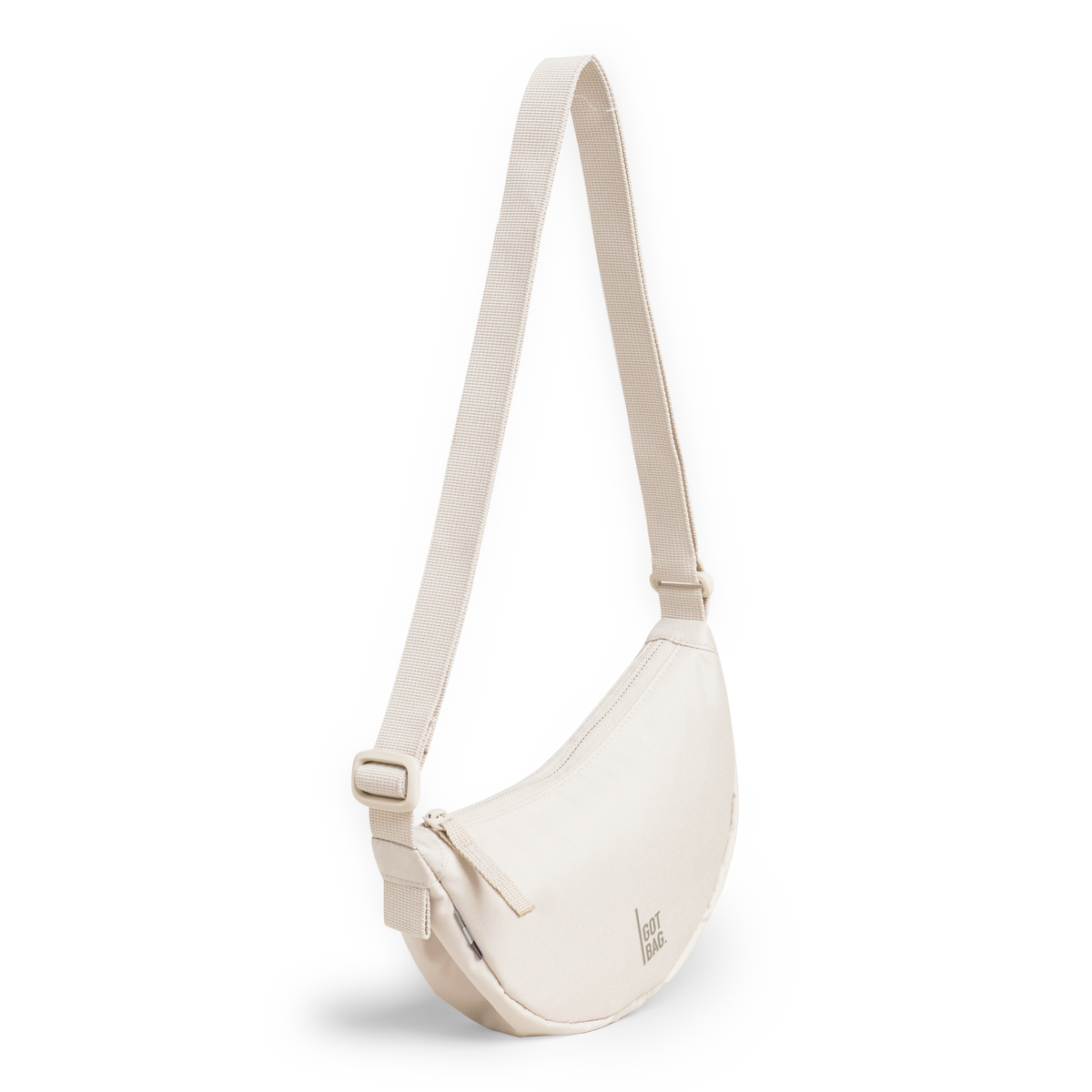 MOON BAG MINI Tasche in soft shell (warmes Cremeweiß) in Schrägansicht.