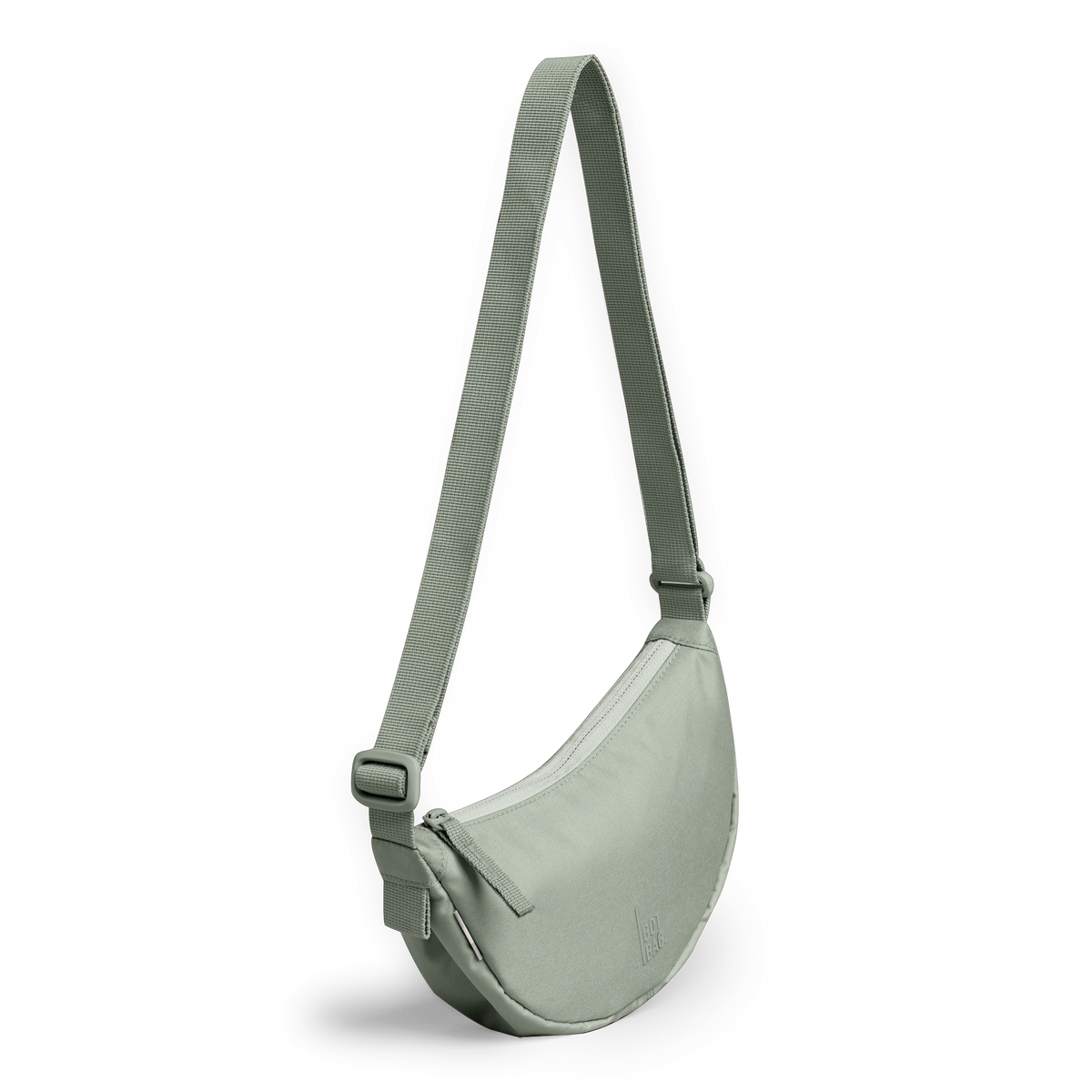MOON BAG MINI Tasche in bass (Salbeigrün) als Studioaufnahme in diagonaler Ansicht.