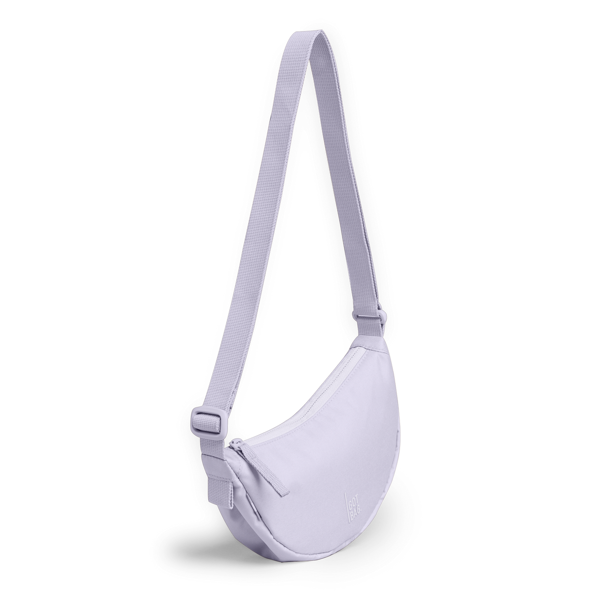MOON BAG MINI Tasche in purple coral (pastellfarbenes helles Flieder) in diagonaler Ansicht.