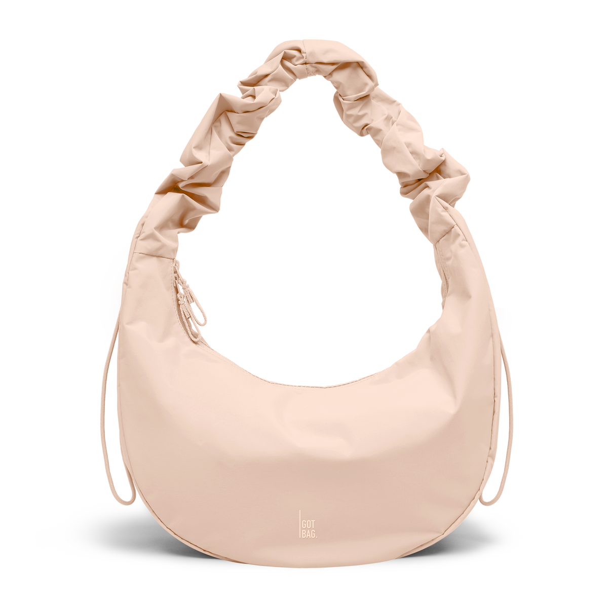 MOON BAG RUFFLE bag in pearl (light powder pink) as studio shot in front view.