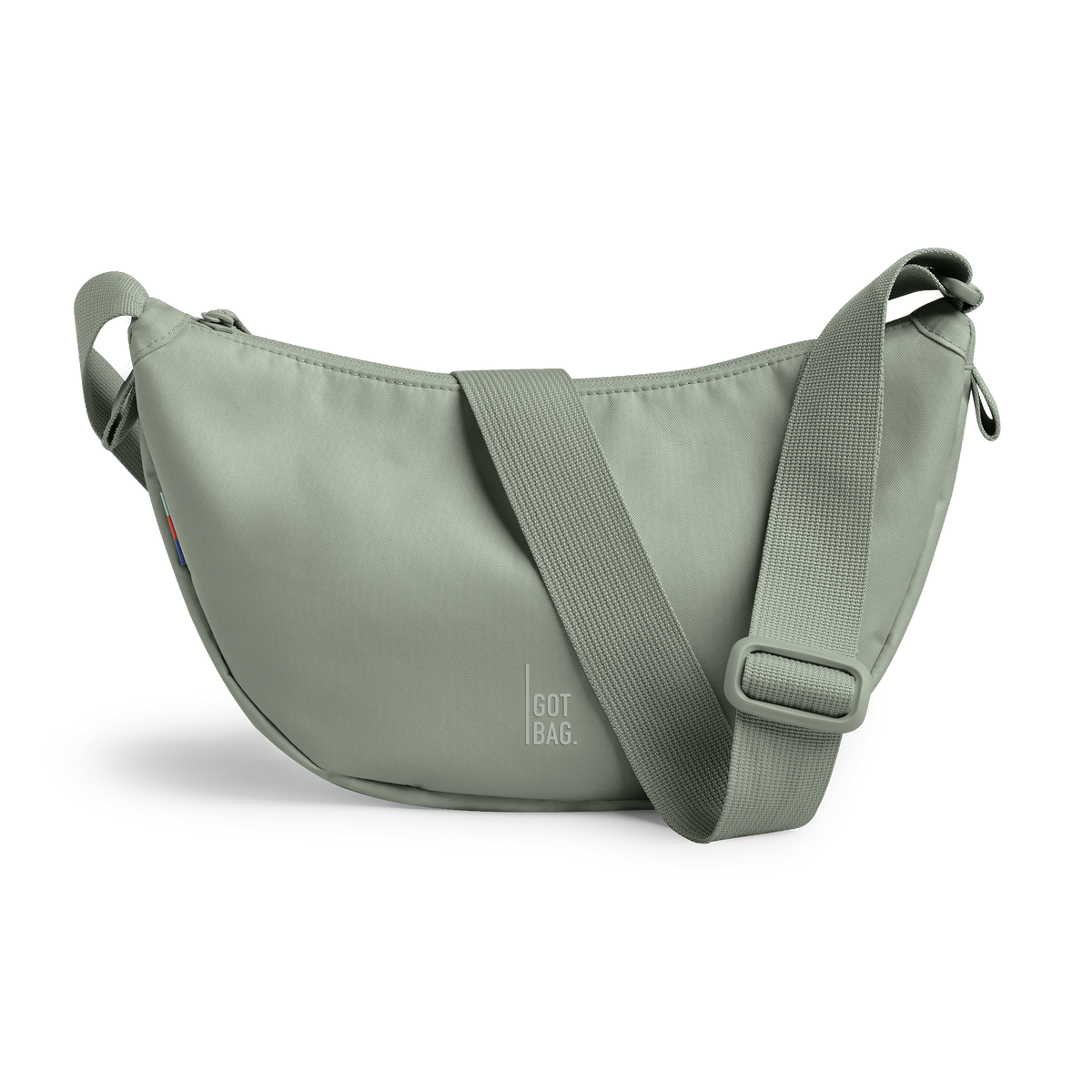 MOON BAG SMALL Tas in bass (Saliegroen) als studio-opname in vooraanzicht.