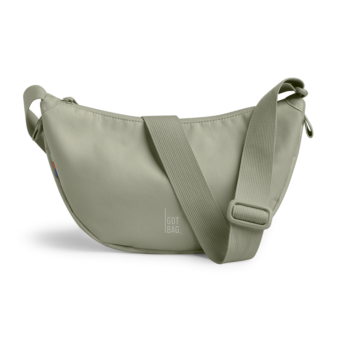 MOON BAG SMALL Tasche in seabed (helles Olivgrün) als Studioaufnahme in Frontansicht.