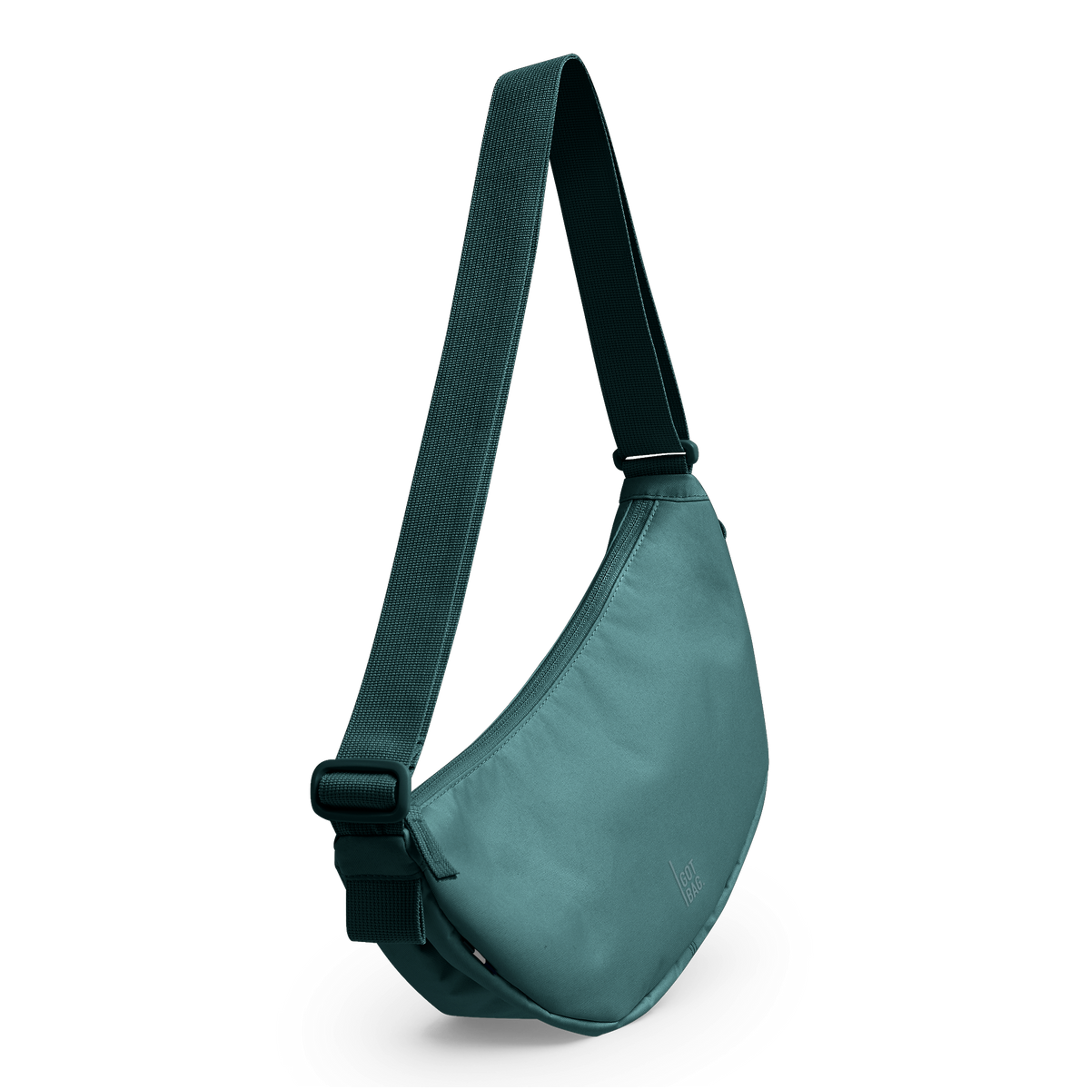 MOON BAG Tasche in sea teal (kühles Türkisgrün) in diagonaler Ansicht.