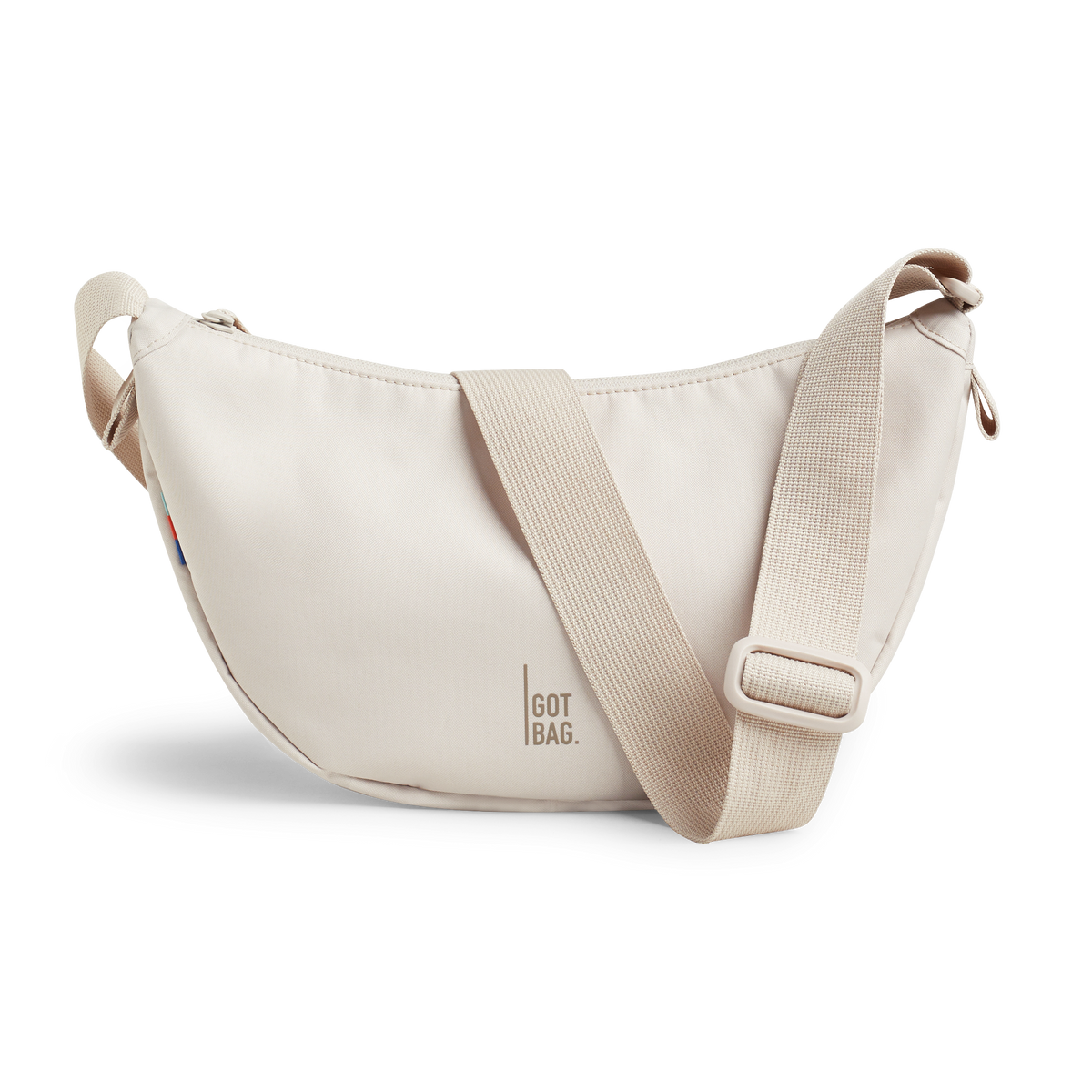MOON BAG torba w soft shell (ciepła kremowa biel) jako zdjęcie studyjne z przodu.