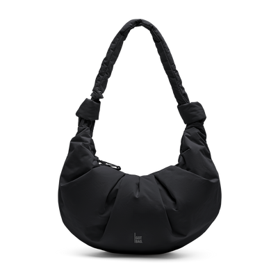 PLEAT MOON BAG LARGE bag in black (classic black) as a studio shot in front view.