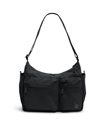 POcKET SLING BAG Tasche in black (Schwarz) als Studioaufnahme in Frontansicht.