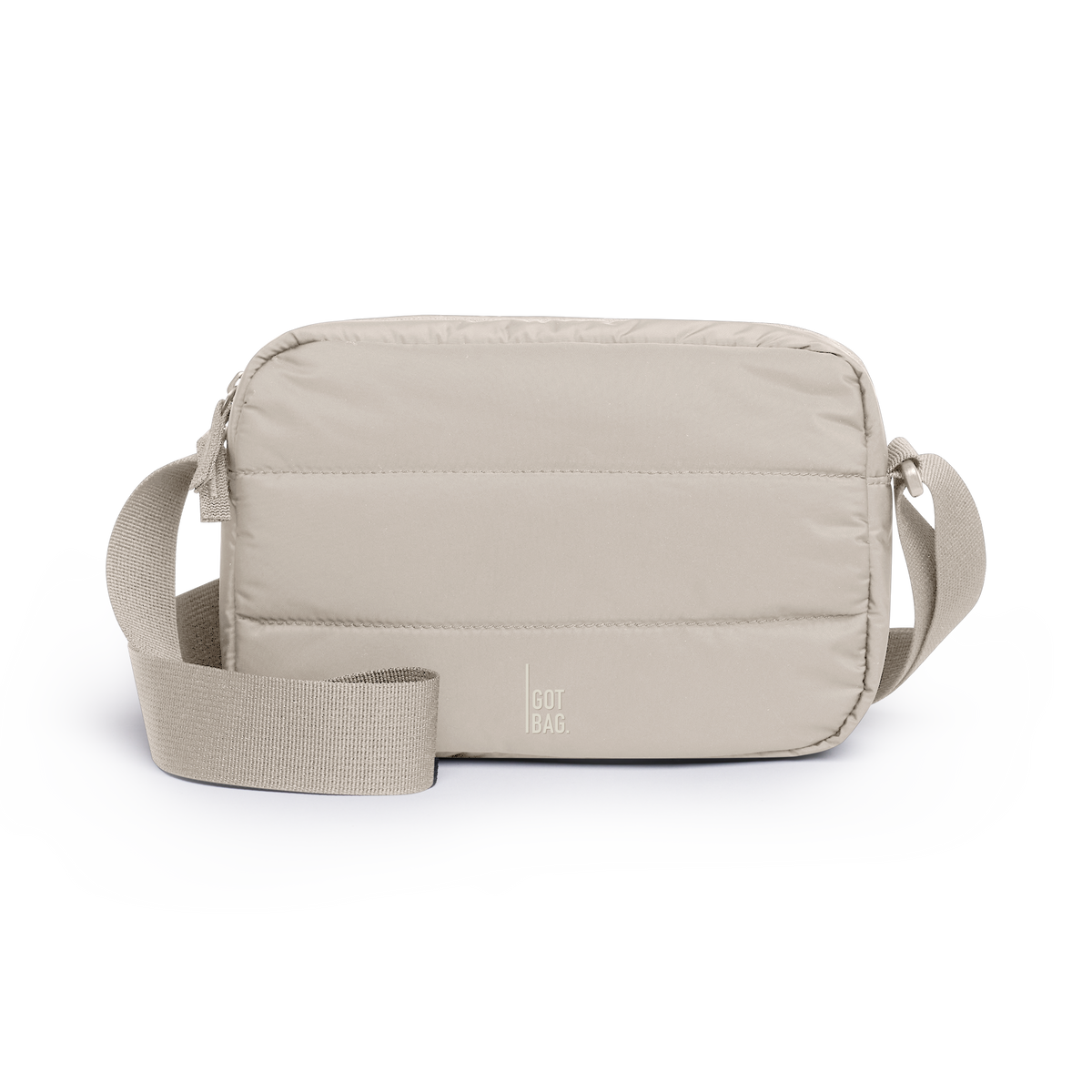 PUFFER CROSSBODY BAG Tasche in scallop (helles Beige) als Studioaufnahme in Frontansicht.