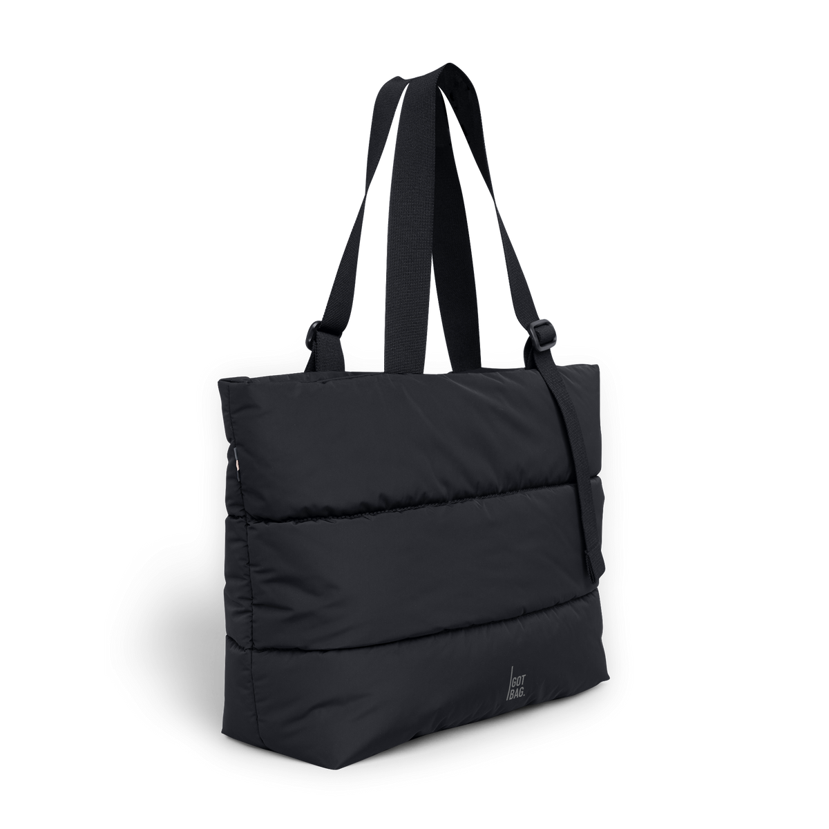 PUFFER TOTE BAG Tasche in black (Schwarz) in diagonaler Ansicht.