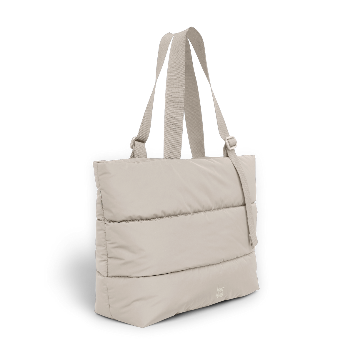 PUFFER TOTE BAG Tasche in scallop (helles Beige) in diagonaler Ansicht.