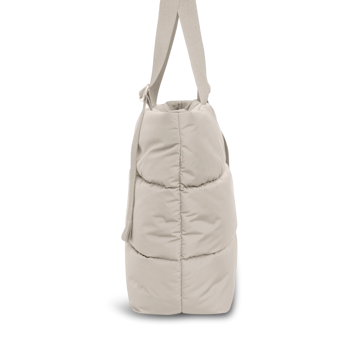 PUFFER TOTE BAG Tasche in scallop (helles Beige) mit Steppdesign, in Seitenansicht schwebend dargestellt.