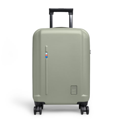RE SHELL CABIN suitcase in bass (sage green) as a studio shot, front view.
