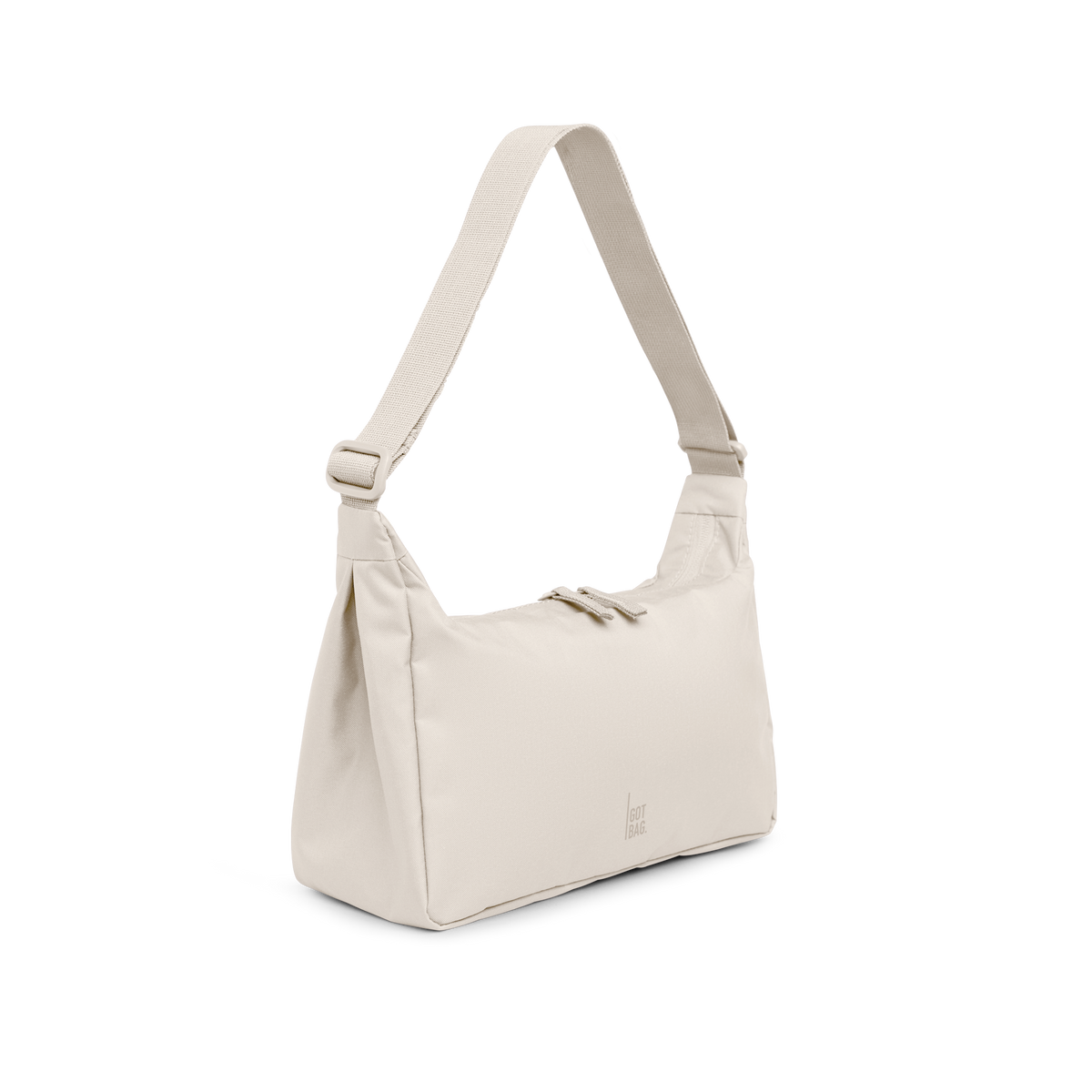 SQUARE BAG SMALL Monochrome Edition Tasche in soft shell (warmes Cremeweiß) in diagonaler Ansicht.