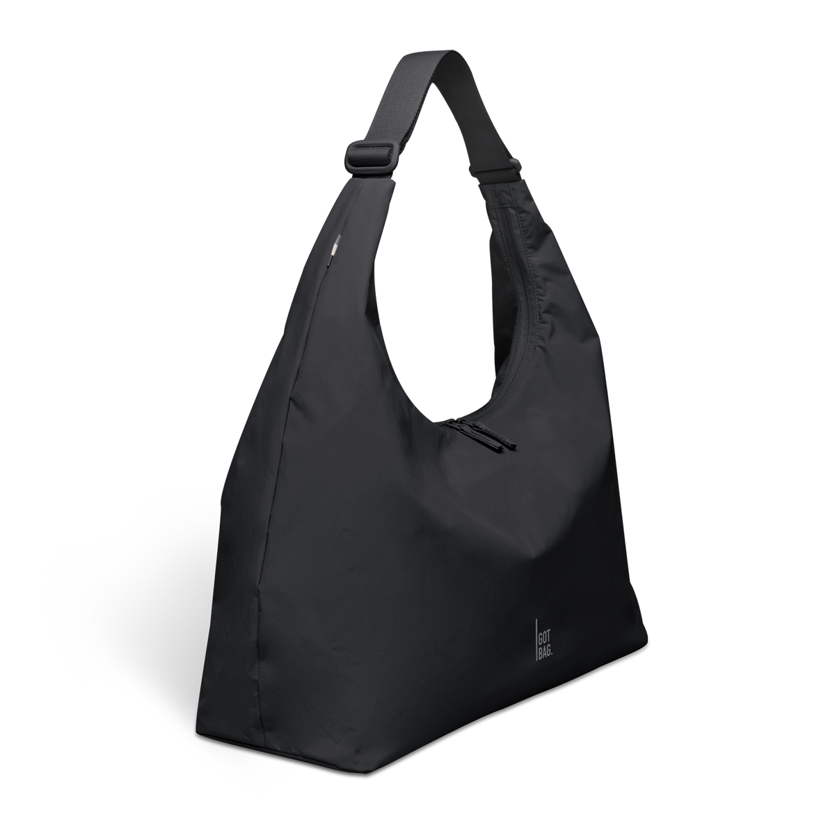 T SHAPE BAG LARGE Monochrome Edition Tasche in black (Schwarz) als Studioaufnahme in Schrägansicht.