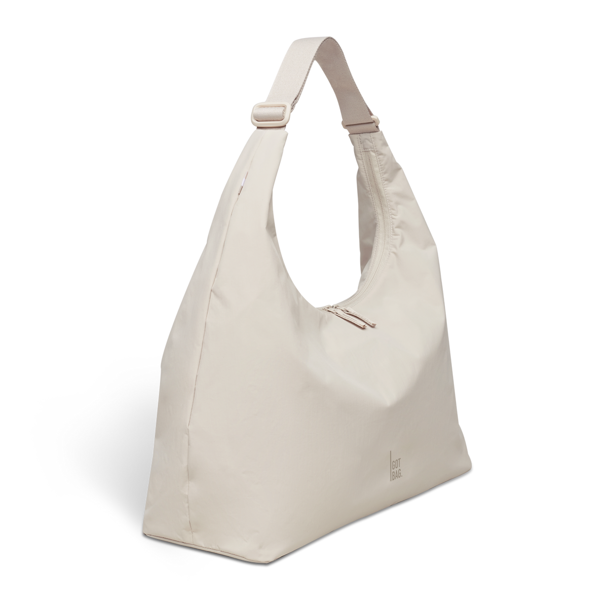 T-SHAPE BAG MONOCHROME EDITION LARGE Tasche in soft shell (warmes Cremeweiß) in Diagonale Ansicht.
