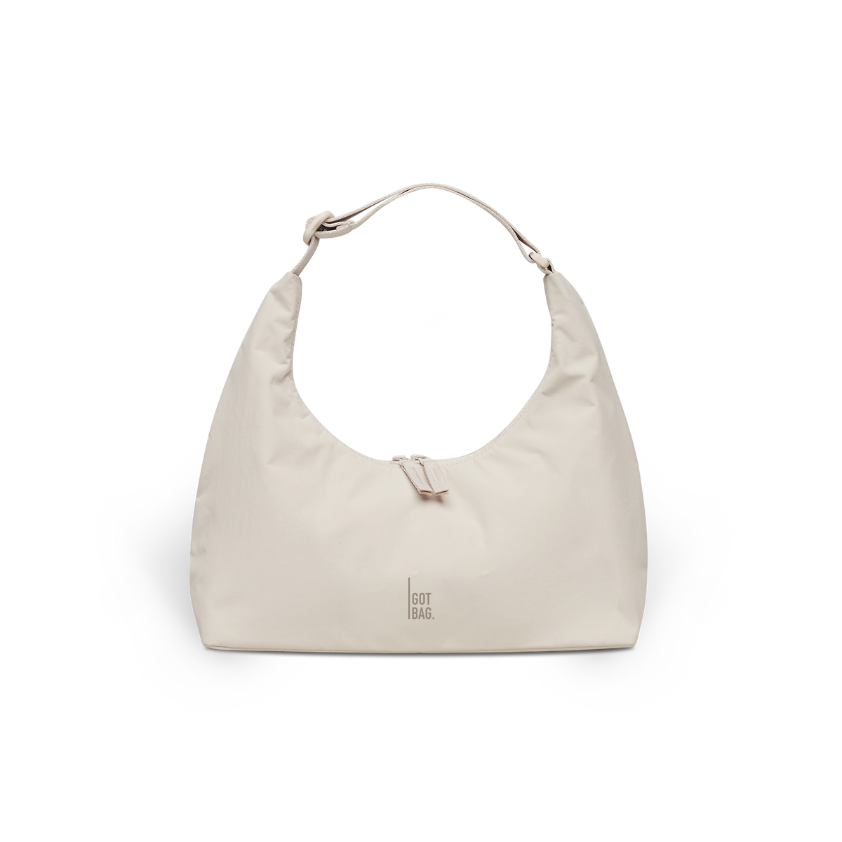 T-SHAPE BAG MONOCHROME EDITION MINI Tasche in soft shell (warmes Cremeweiß) als Studioaufnahme in Frontansicht.