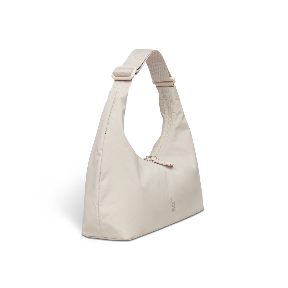 T SHAPE BAG MINI Tasche in soft shell (warmes Cremeweiß) in Schrägansicht.
