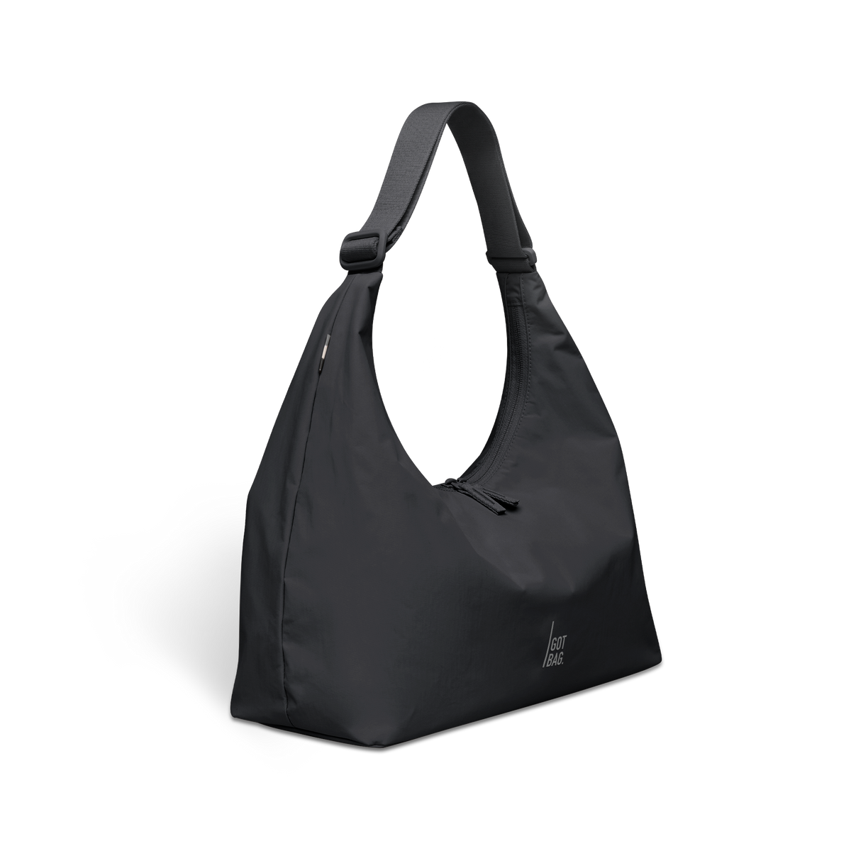 T SHAPE BAG Tasche in black (Schwarz) in Diagonalansicht mit Schatten.