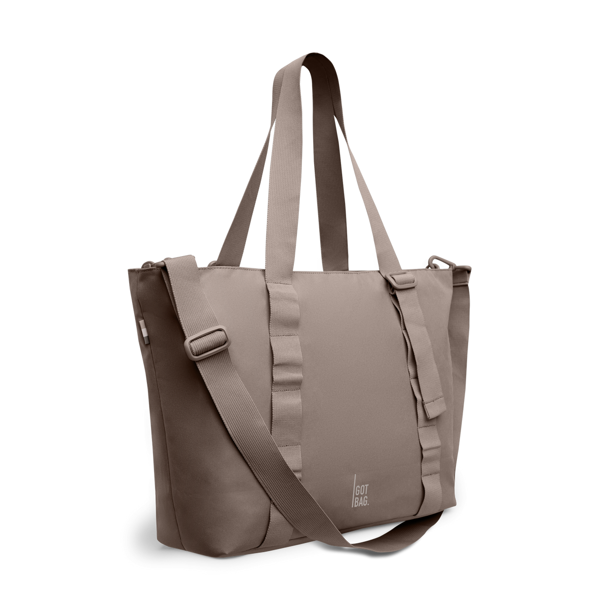 TOTE BAG Monochrome Edition Tasche in oyster (klassisches Taupe-Braun) in diagonaler Ansicht.