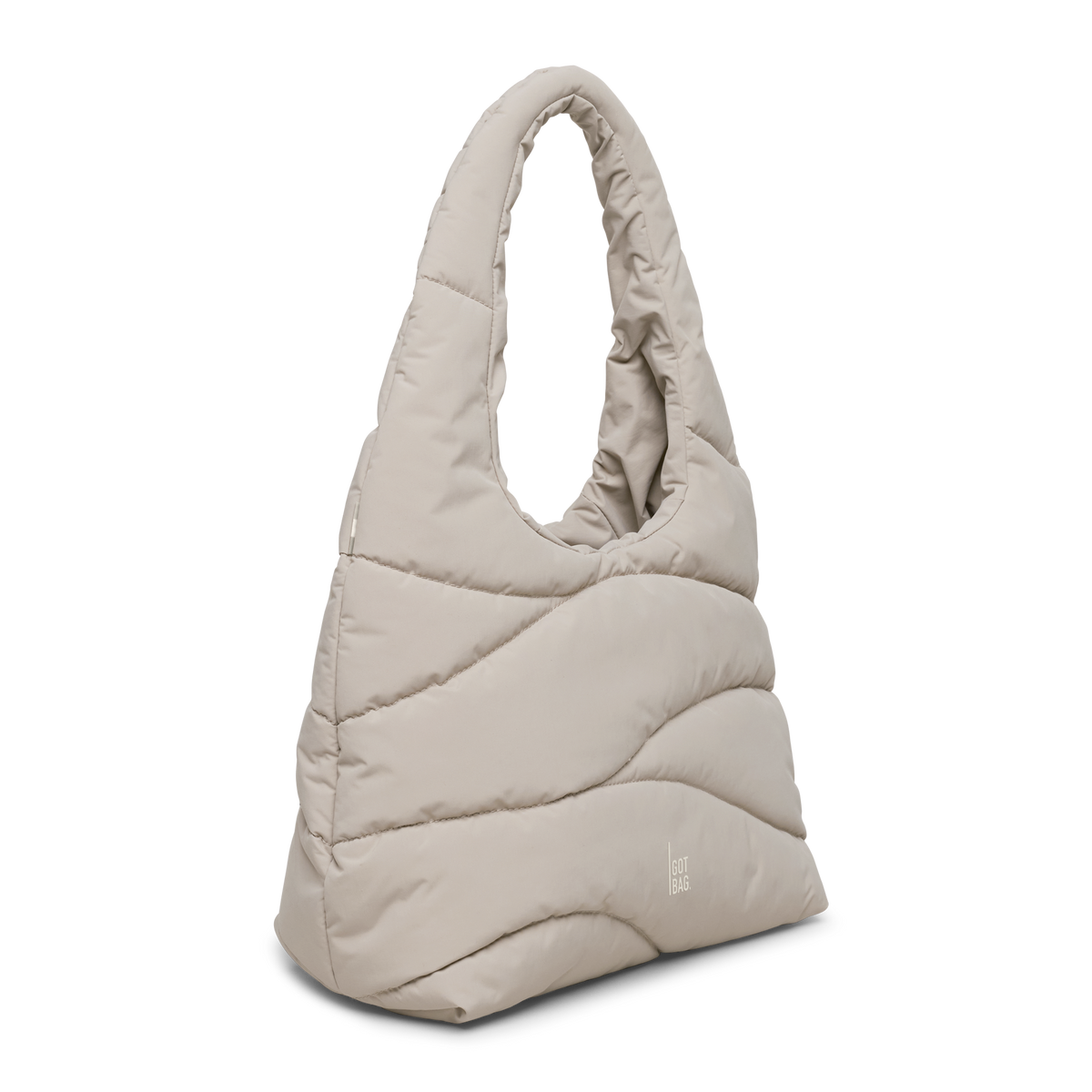 WAVY PUFFER SHOULDER BAG Tasche in scallop (helles Beige) in diagonaler Ansicht.