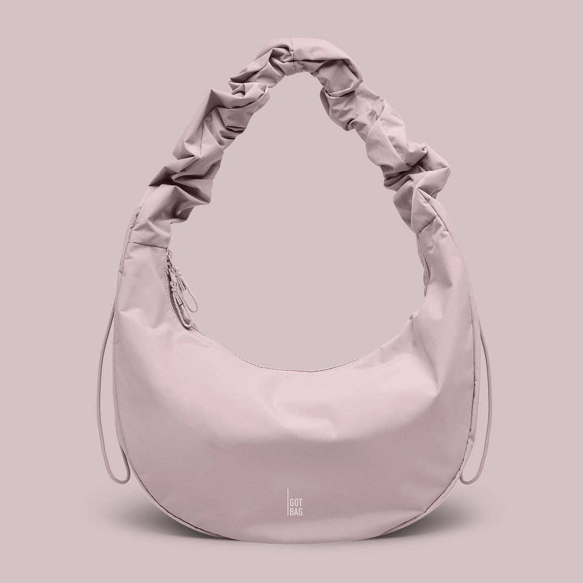 tas in pink dolphin (bleek lichtroze) als studio-opname.
