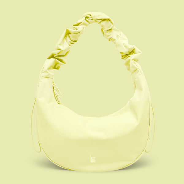 Tas in sea lemon (zacht pastelgeel) als studio-opname in vooraanzicht.